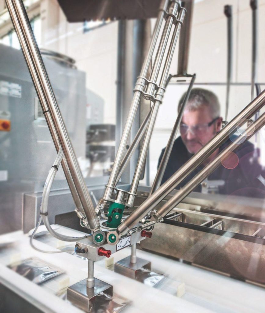 Metal rods being controlled by AI in a work environment