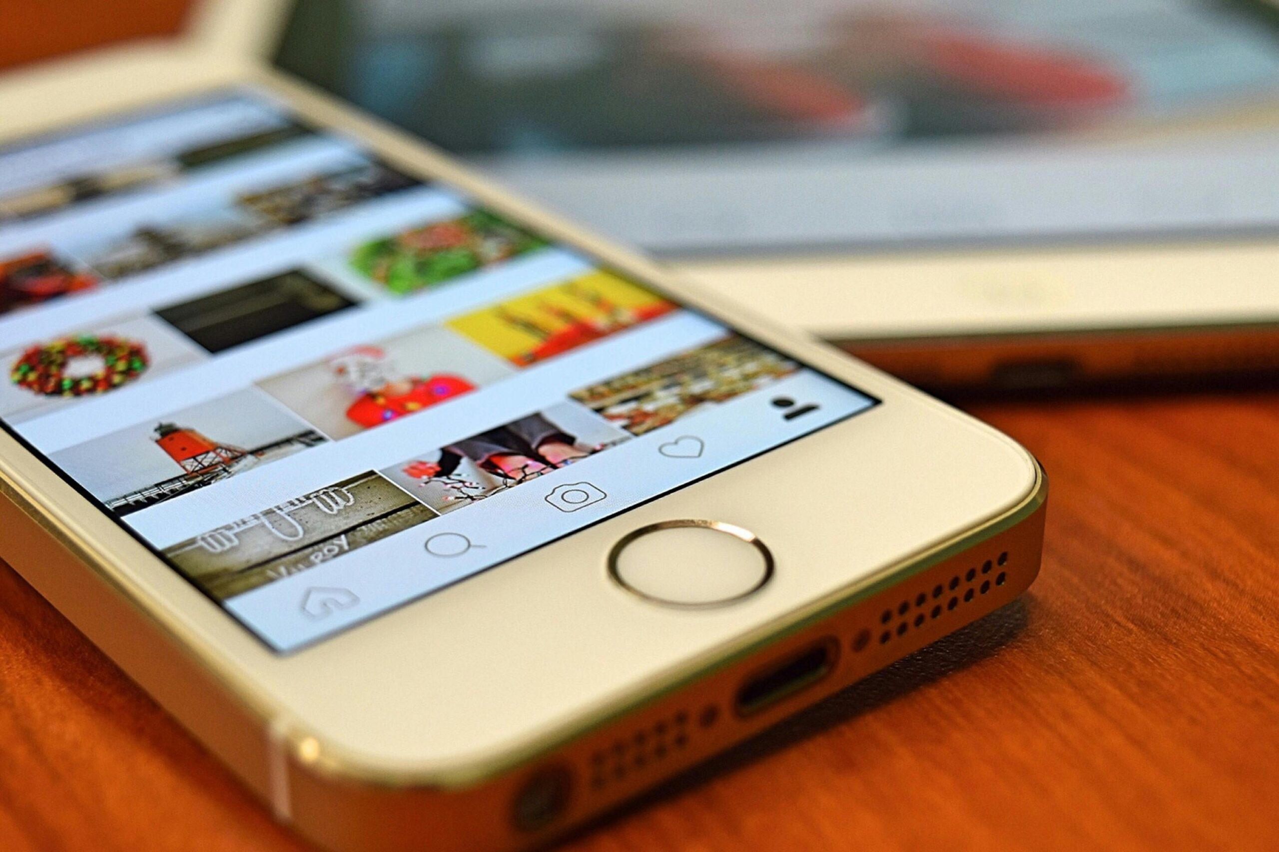 Close up of phone using Instagram - Instagram Tips for Agents