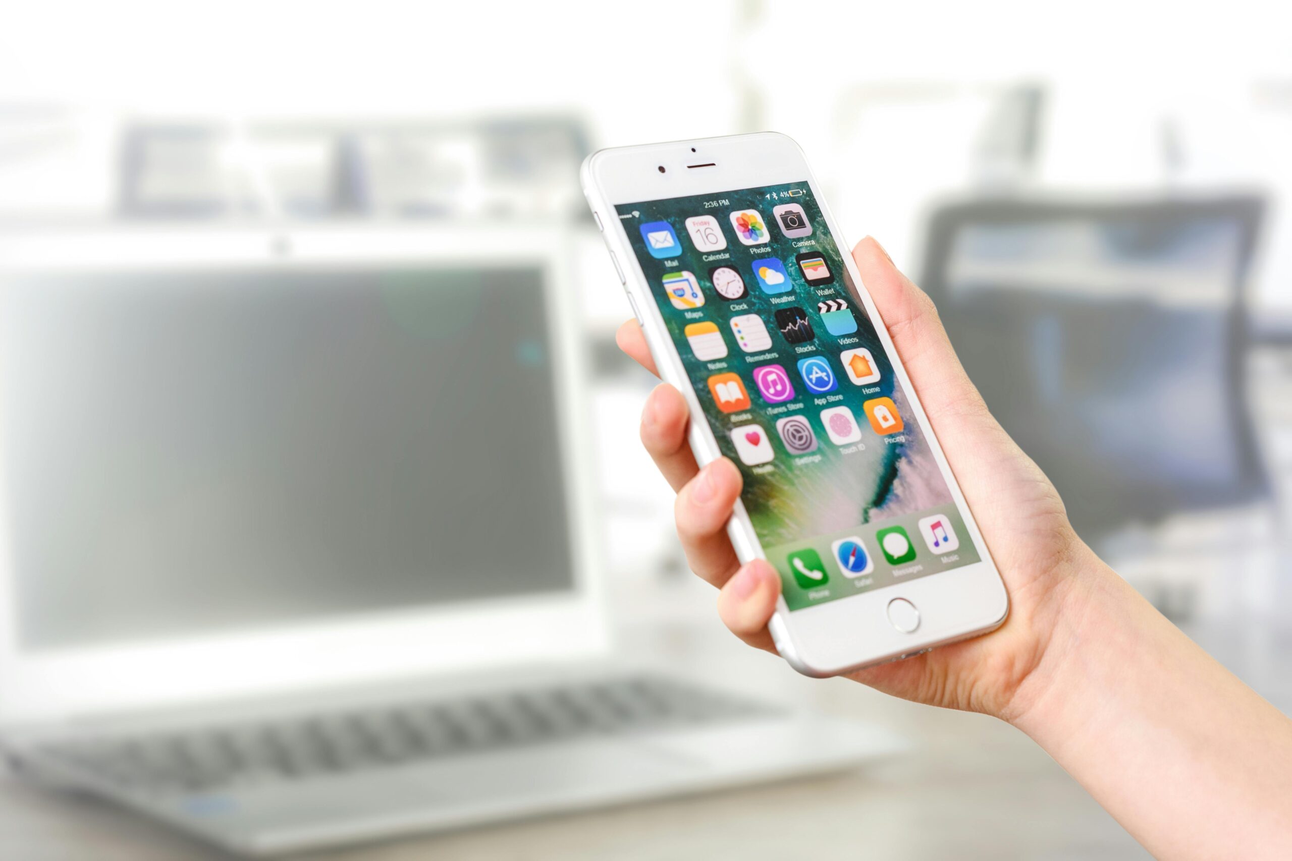 iPhone in hand - Mastering Your Social Media Content Plan