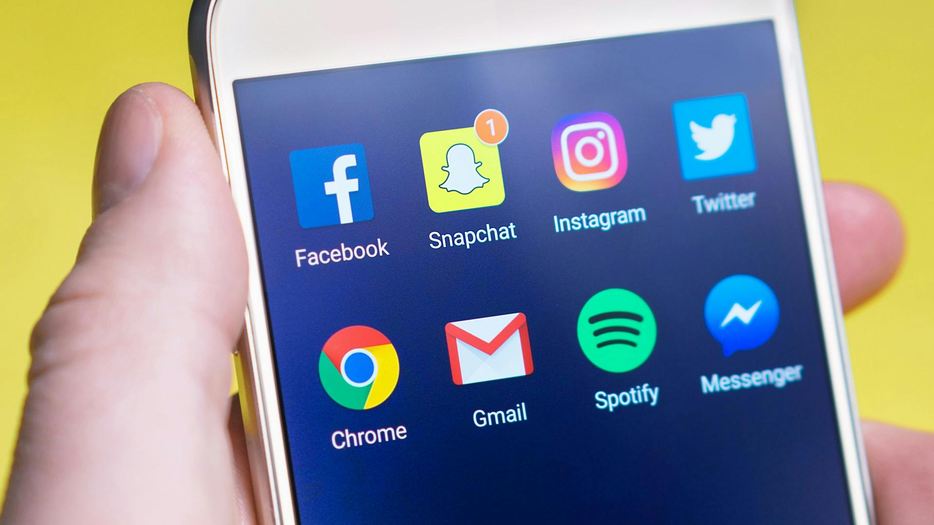 iphone showing social media networks - Mastering Your Social Media Content Plan