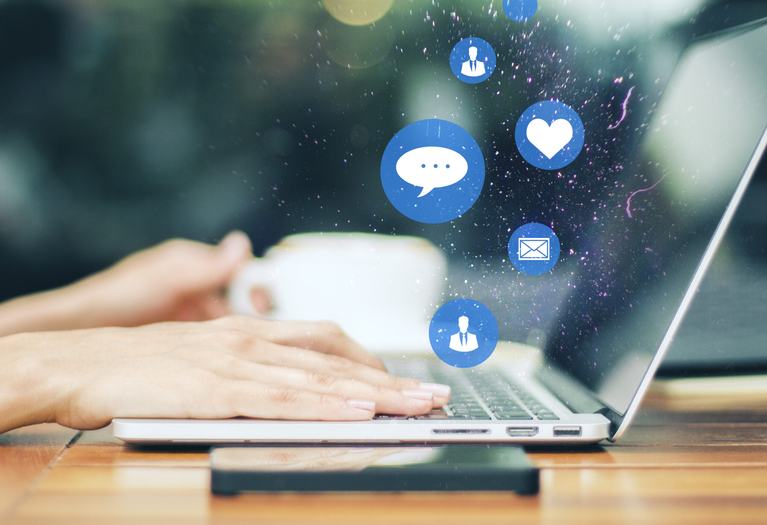 Bluesky vs Twitter - person on social media via a laptop