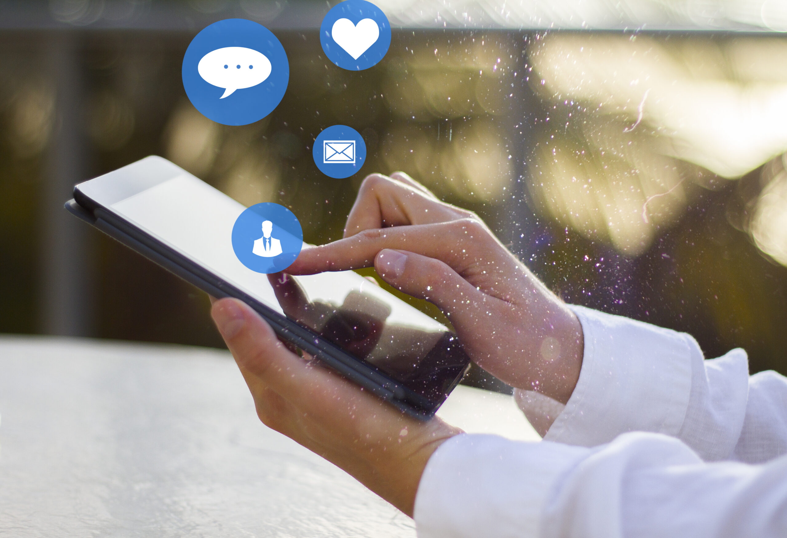 Boost Engagement Without Ads - people on social media with icons on table