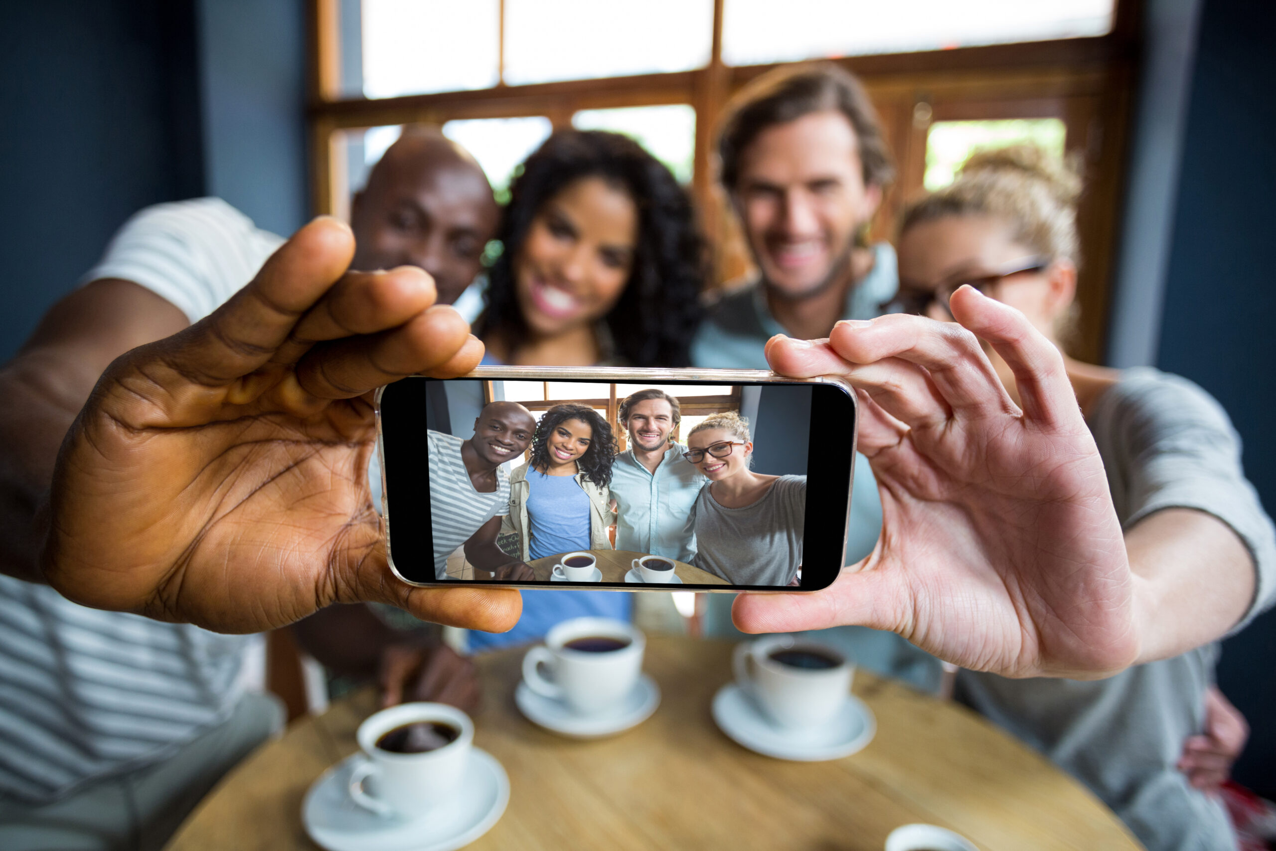 Content Ideas for Engagement That Will Boost Your Social Media - group selfie for social media