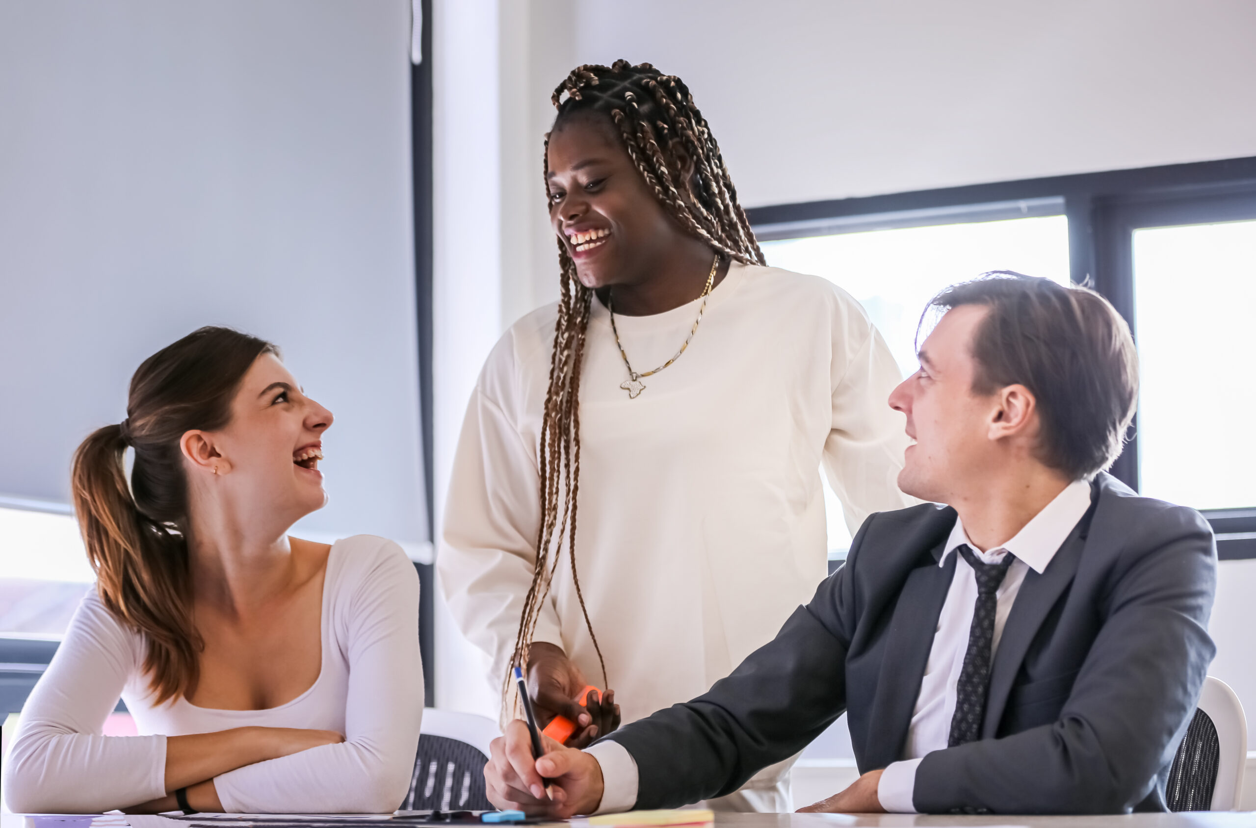 Effective Tactics to Improve Client Retention and Maximise Your Profits - business people smiling meeting