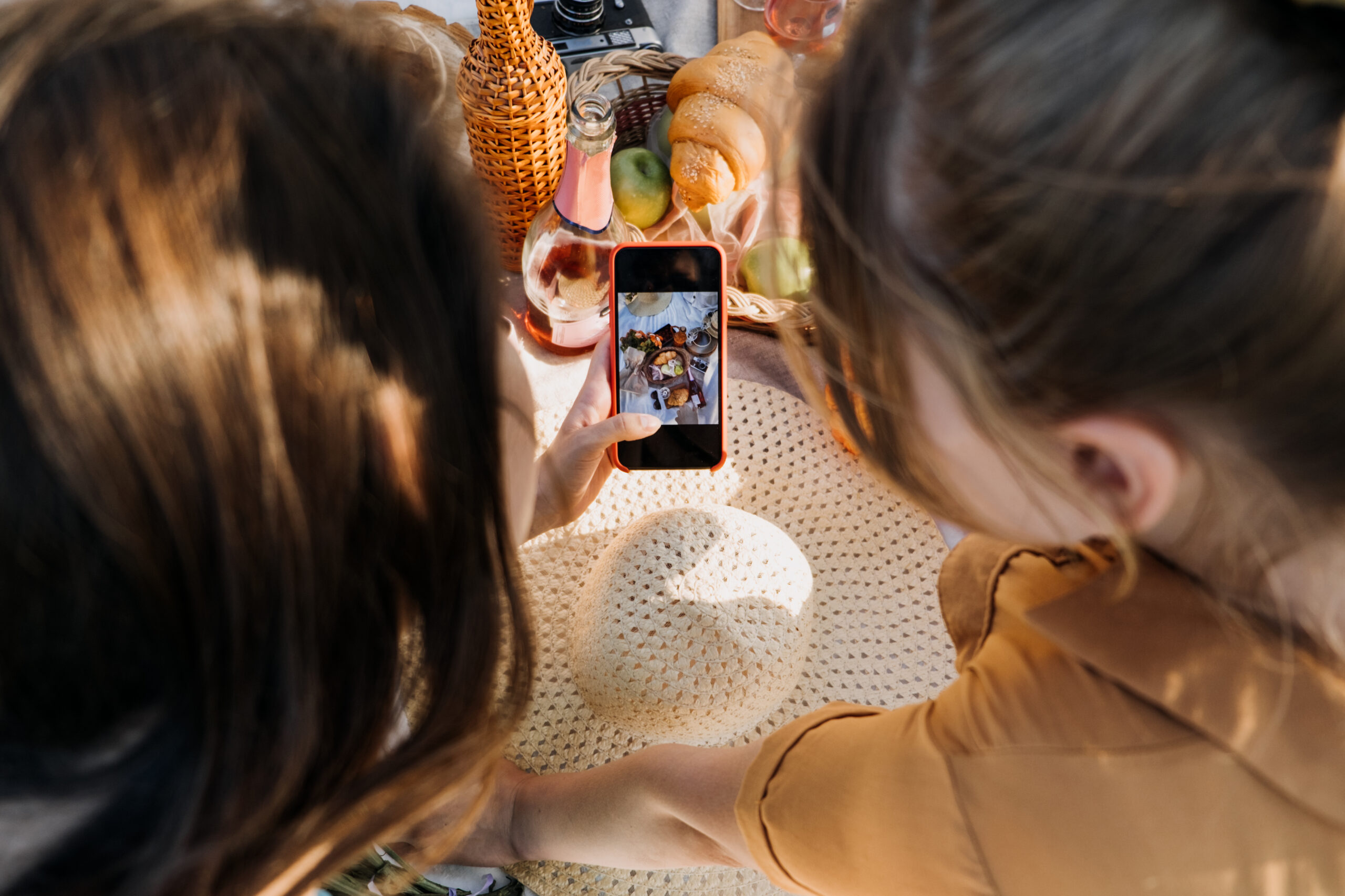 How to Grow on Instagram - content creator showing photo on iphone