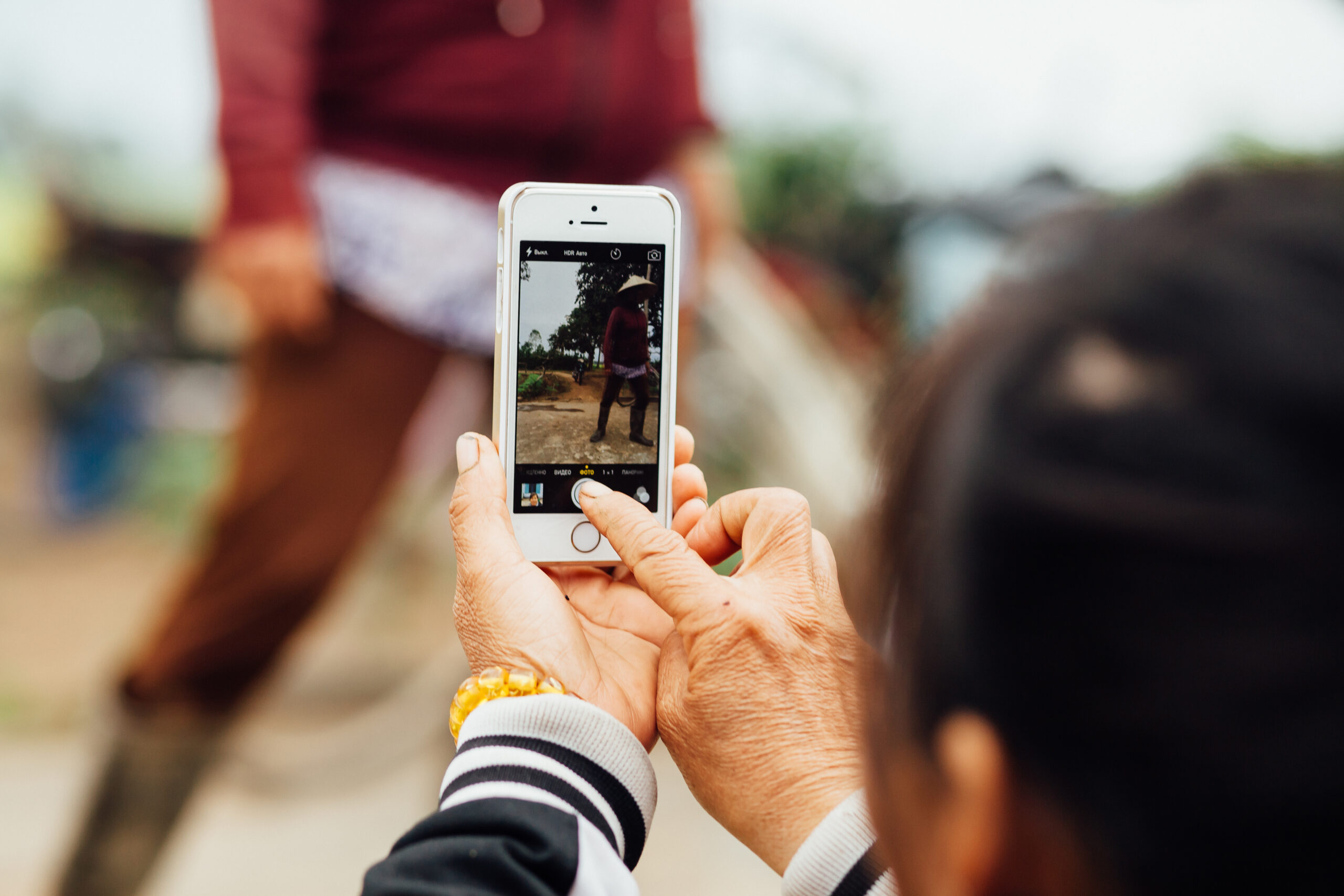 Must-Have Instagram Tools for Small Brands to Quickly Boost Engagement - Influencer using iphone