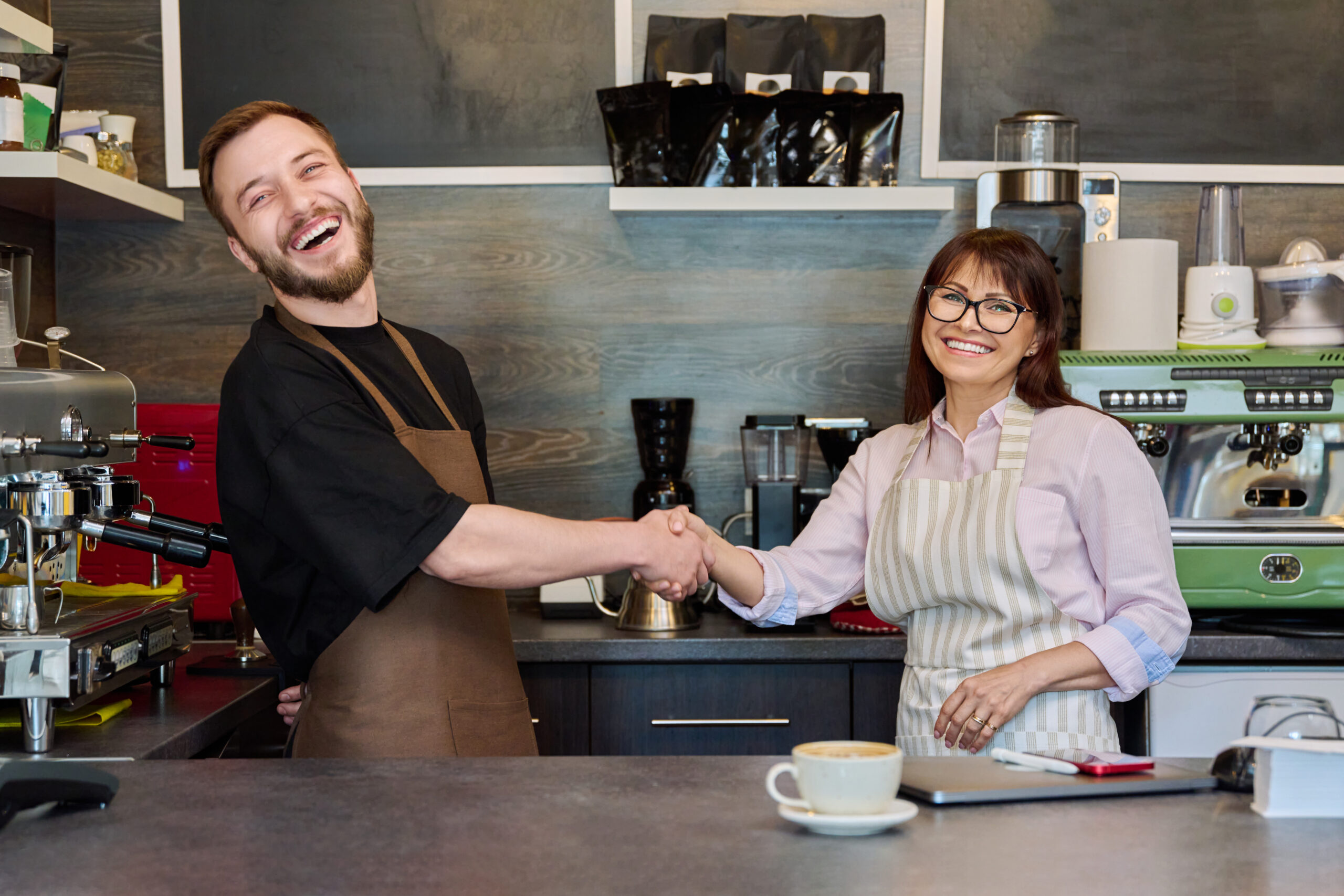 Local Help with Social Media for Growing Small Businesses In the UK - Colleagues shaking hands