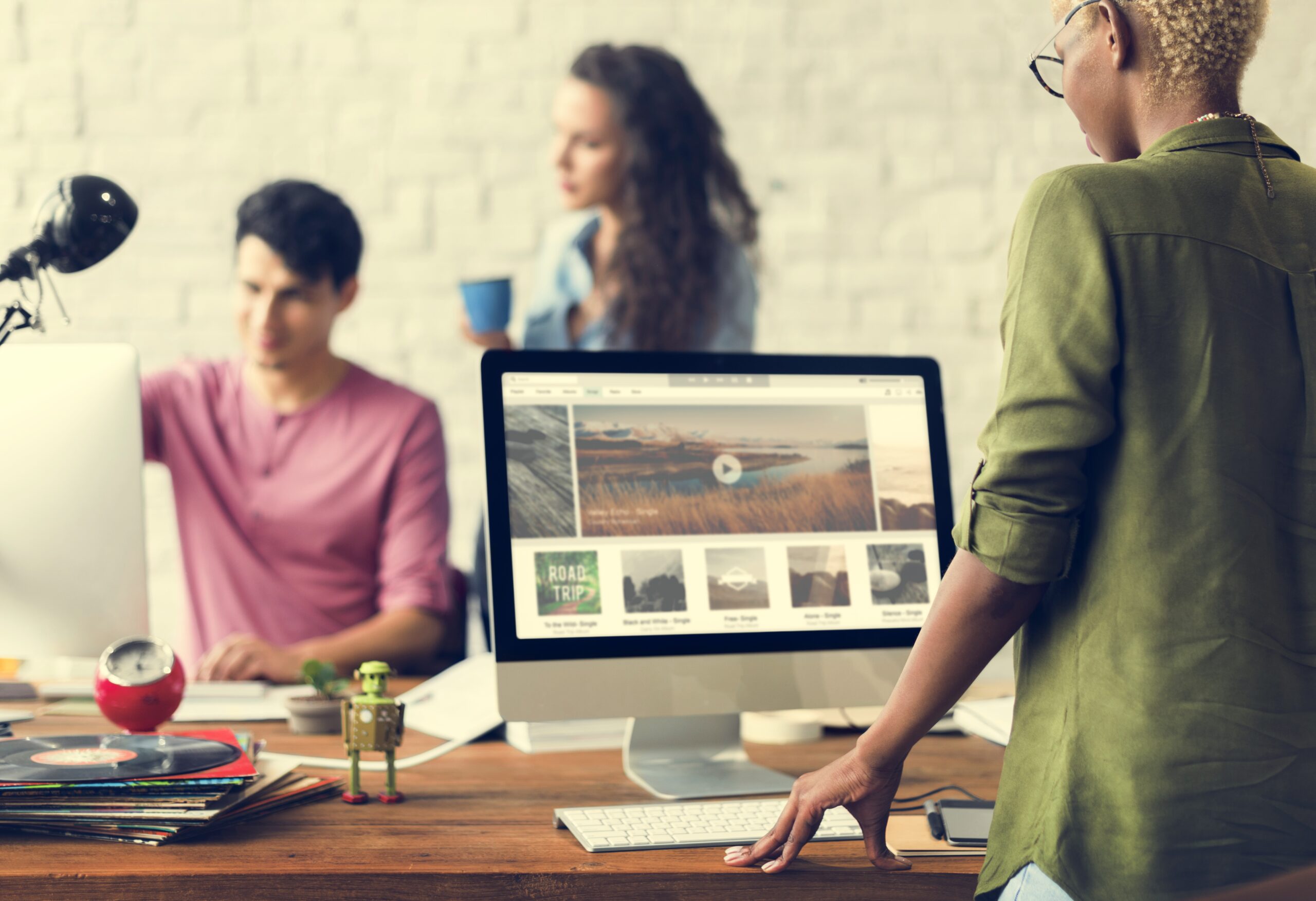 Premium Managed Site Hosting Built for Speed and Security - team of web designers working on projects