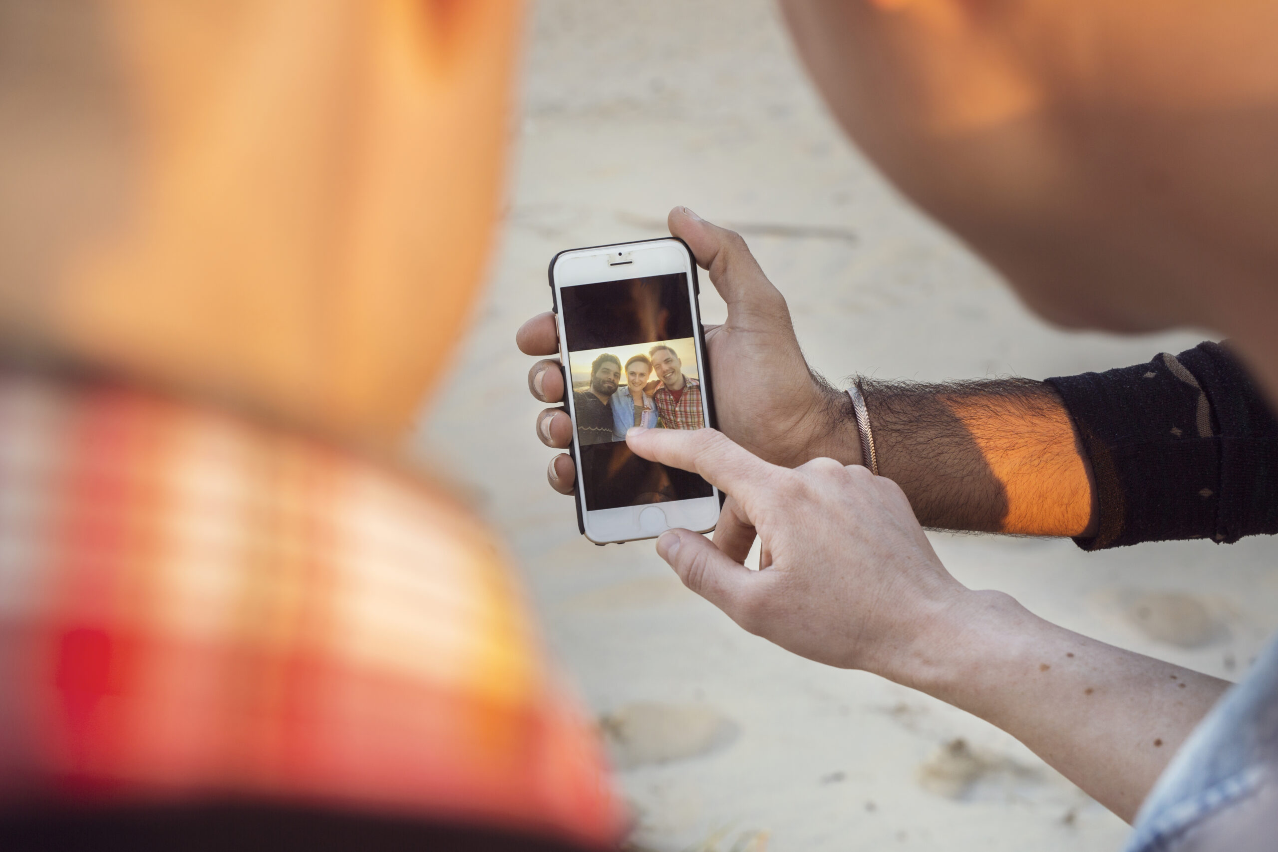 Professional Support for Socials UK – Growth with Expert Online Solutions - social media managers on their phone