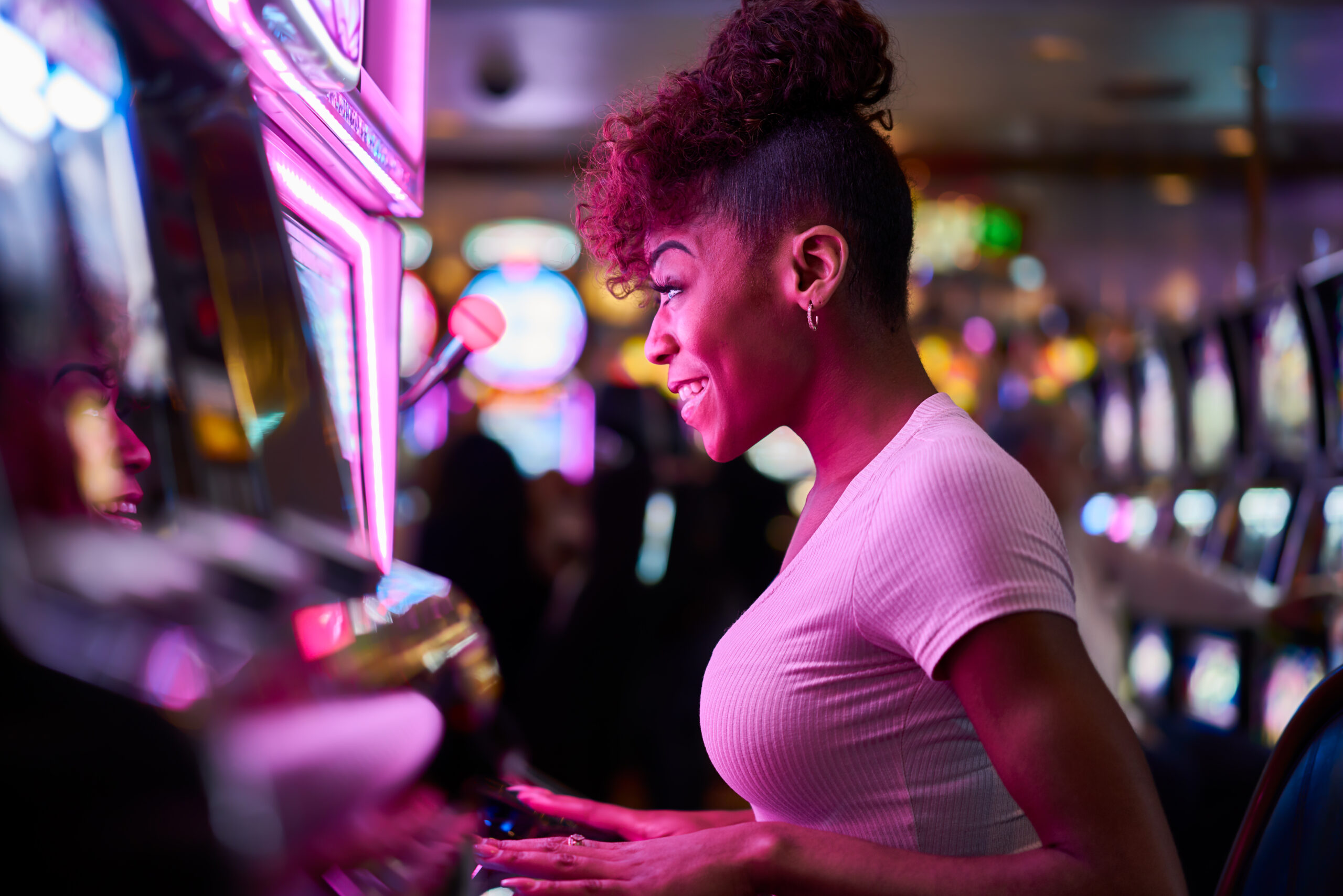 Proven Tactics in Local Advertising for Casinos That Deliver Results - People Playing Poker Together - Woman On Slot Machine in Casino