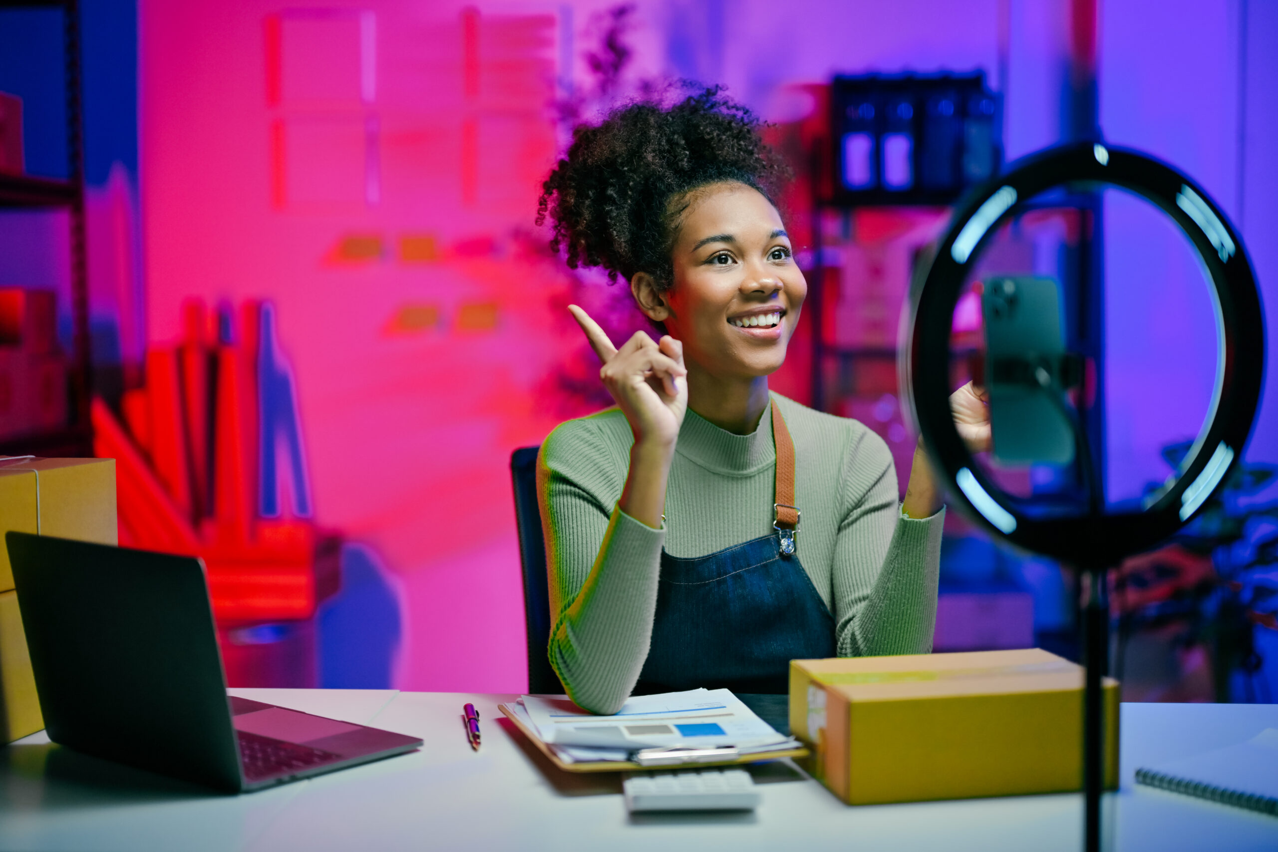 Proven TikTok Ideas for Businesses UK to Drive Engagement & Increase Sales - businesswoman recording tiktok