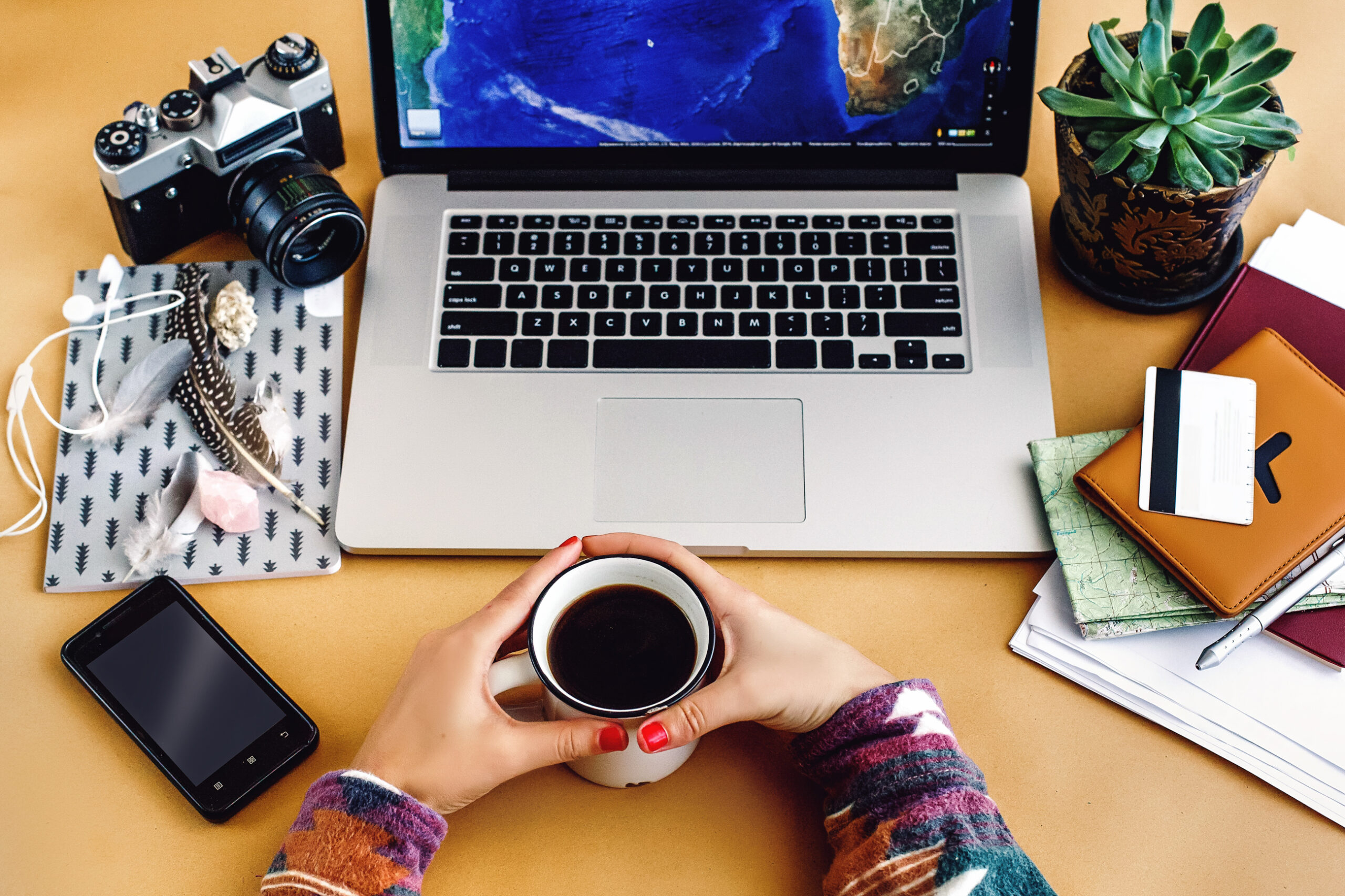 Beginner Blogging Ideas - Inspiring Topics to Launch Your Blog Today - blogger planning at laptop