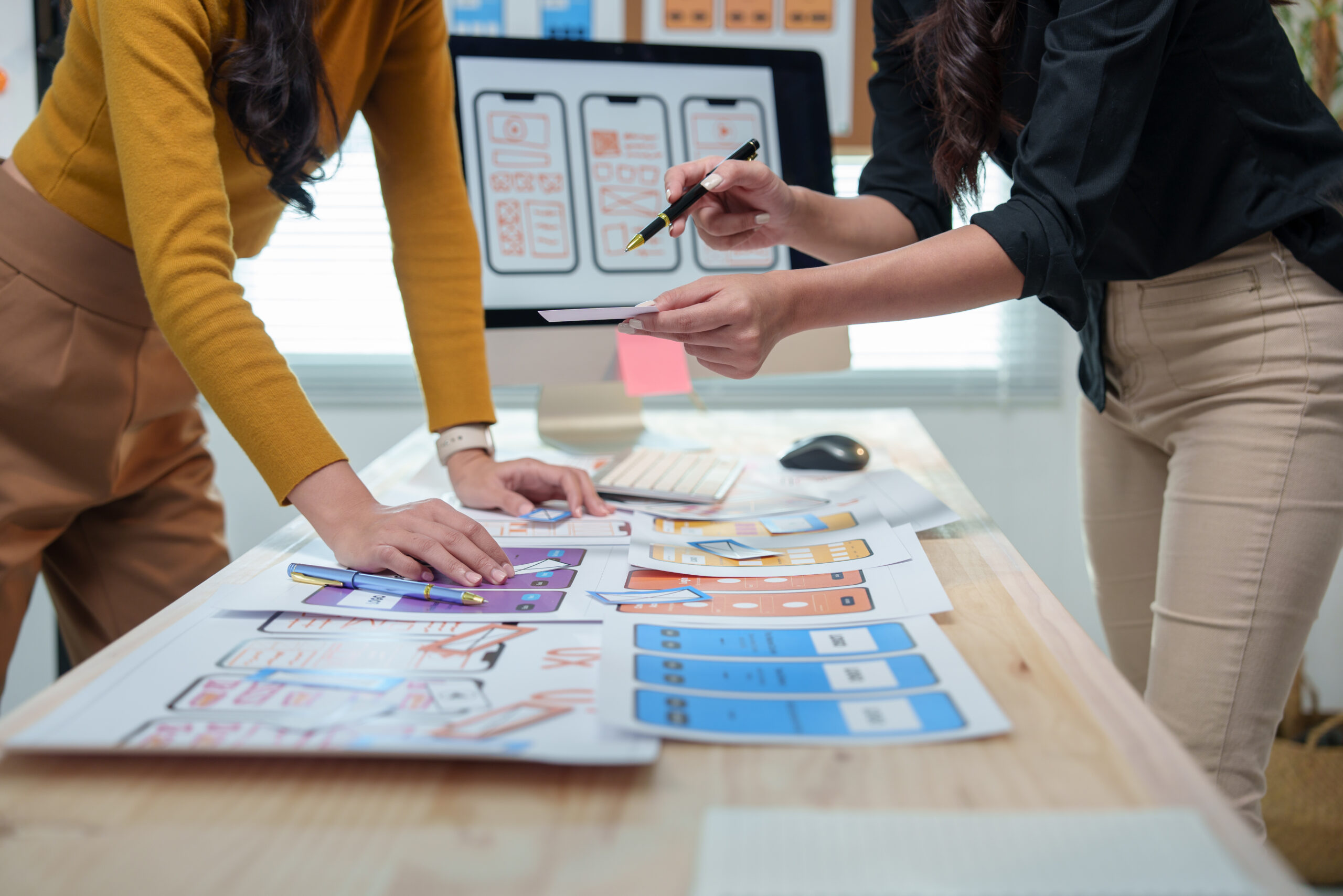 Effective Brand Identity Design - Strengthen Your Business Impact - designers discussing ideas