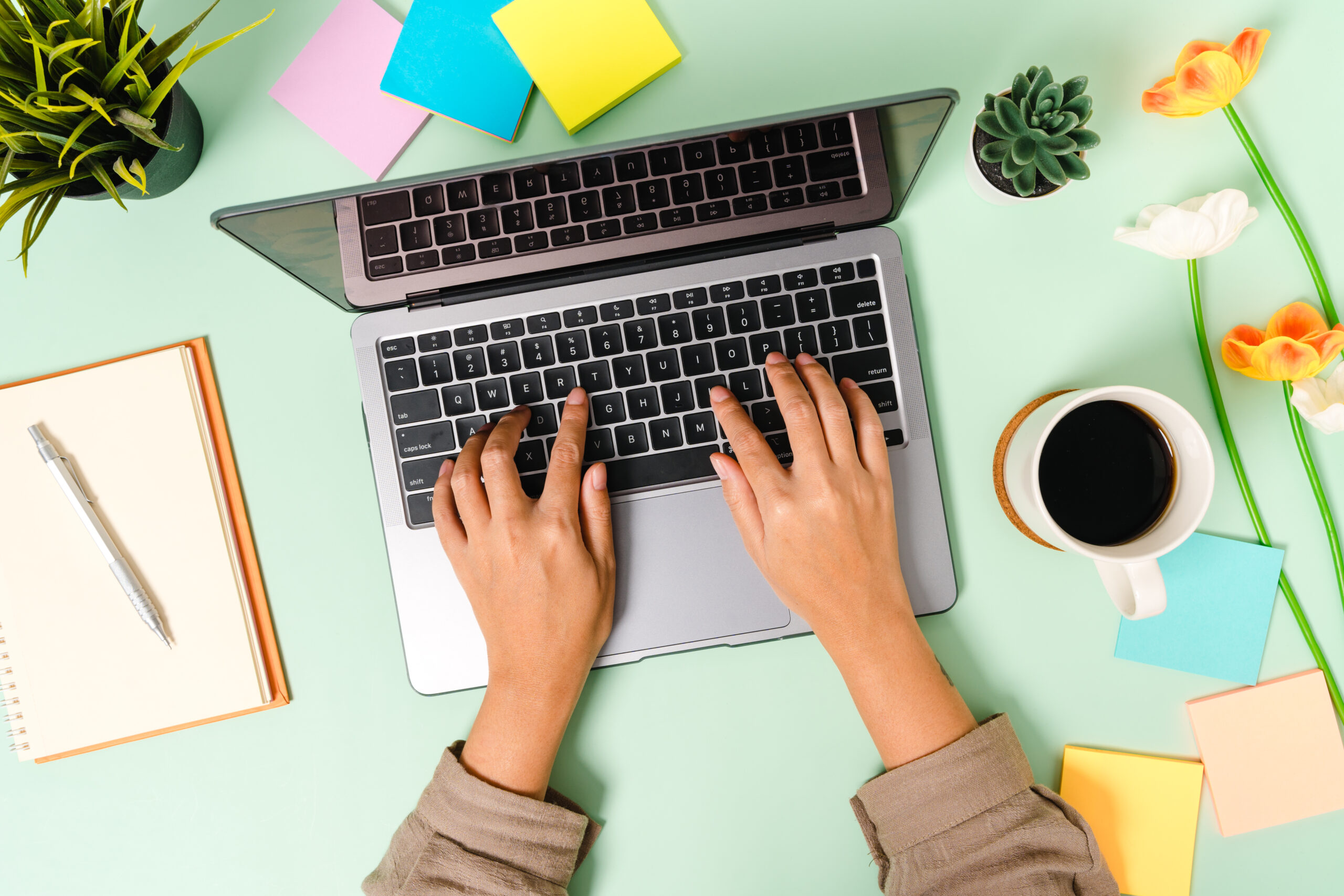 How to Start Blogging - A Beginner’s Guide to Create Your Blog Today - office desk with blogger