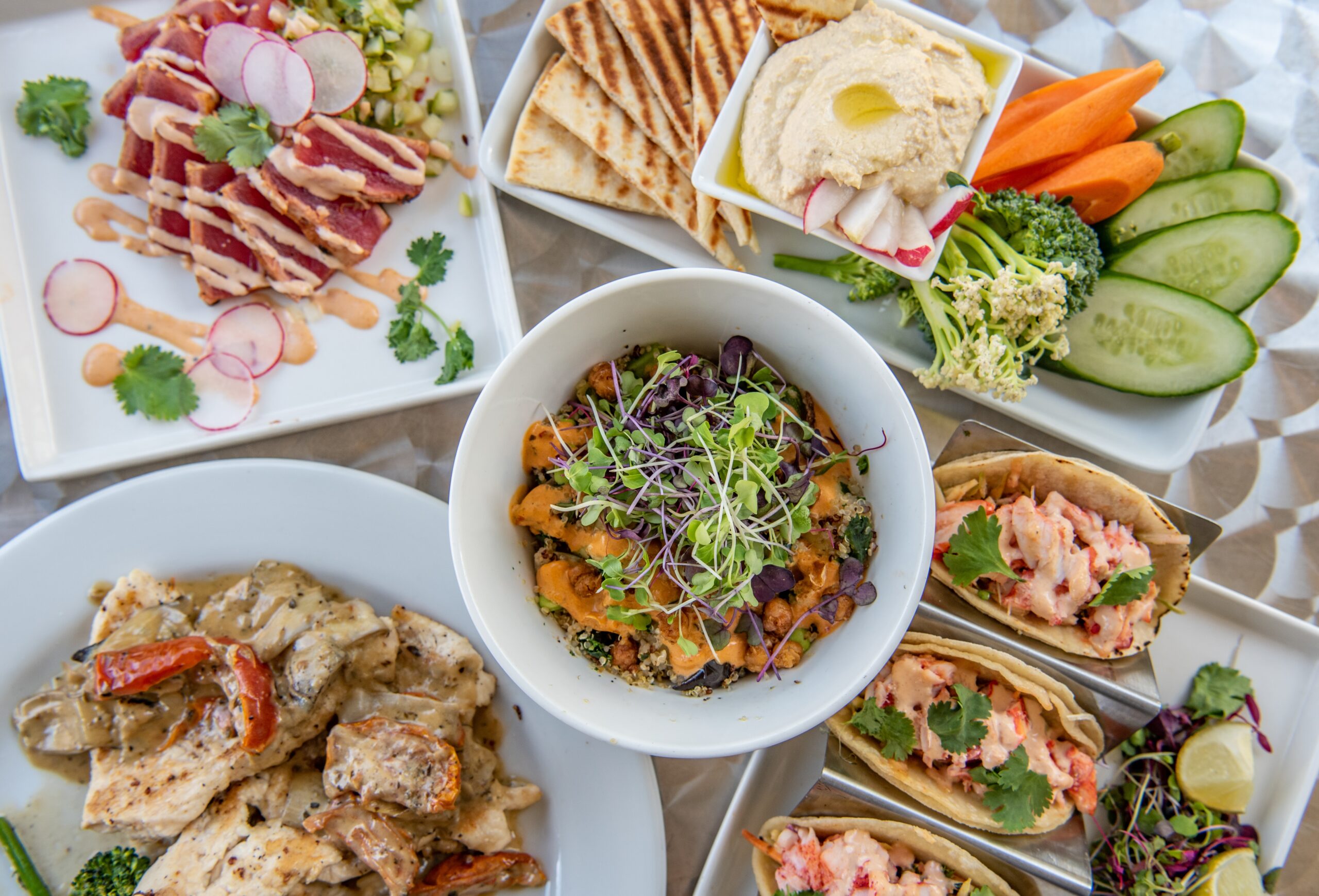 Proven Tips to Launch New Menu Online and Draw Diners to Your Restaurant - table of multiple dishes