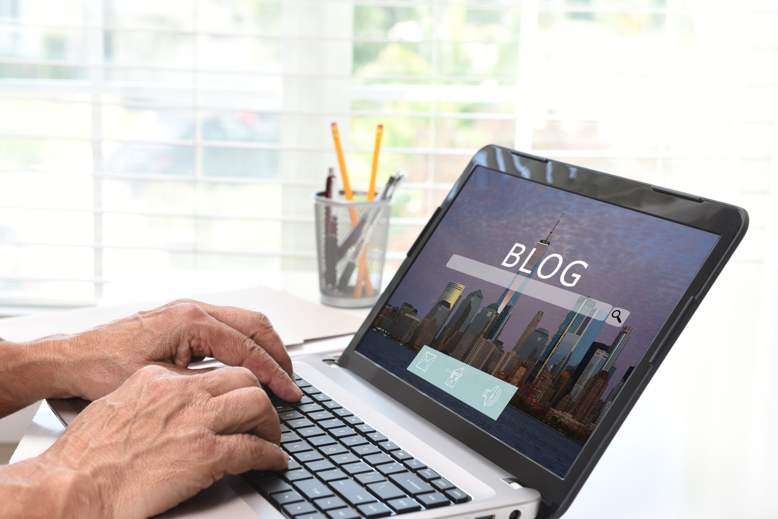 Smart Strategies for Blog Content Ideas Generation Success in 2026 - blogger at laptop