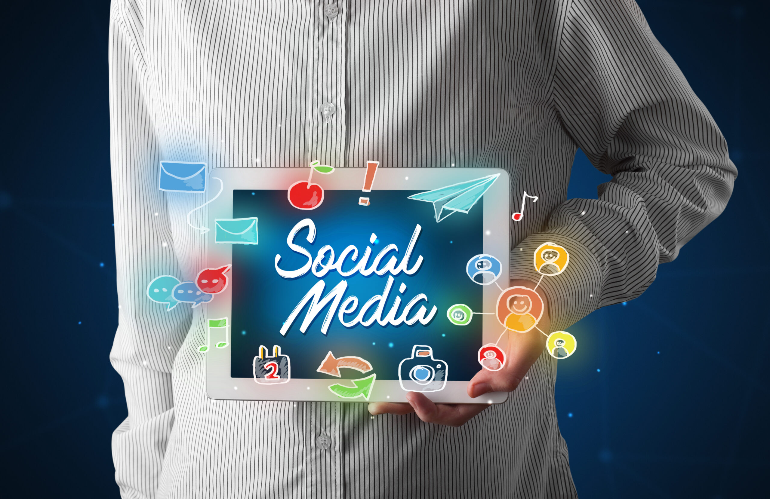 Tips for Crafting Engaging Social Media Posts That Spark Meaningful Interaction - young people socialising - tablet saying social media