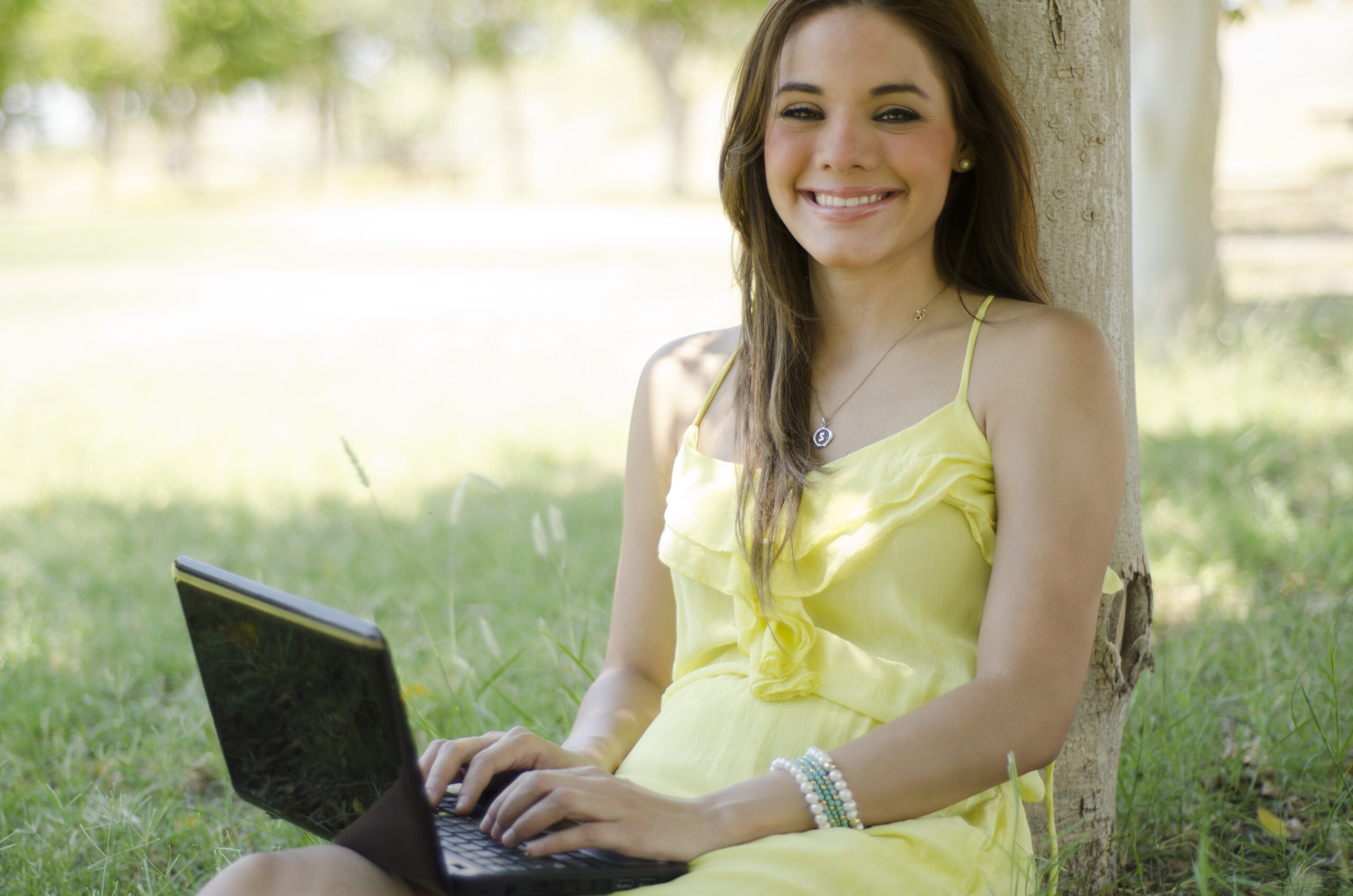 Tips to Craft Engaging Content for Blogging That Captivates and Retains Readers - woman on laptop in garden