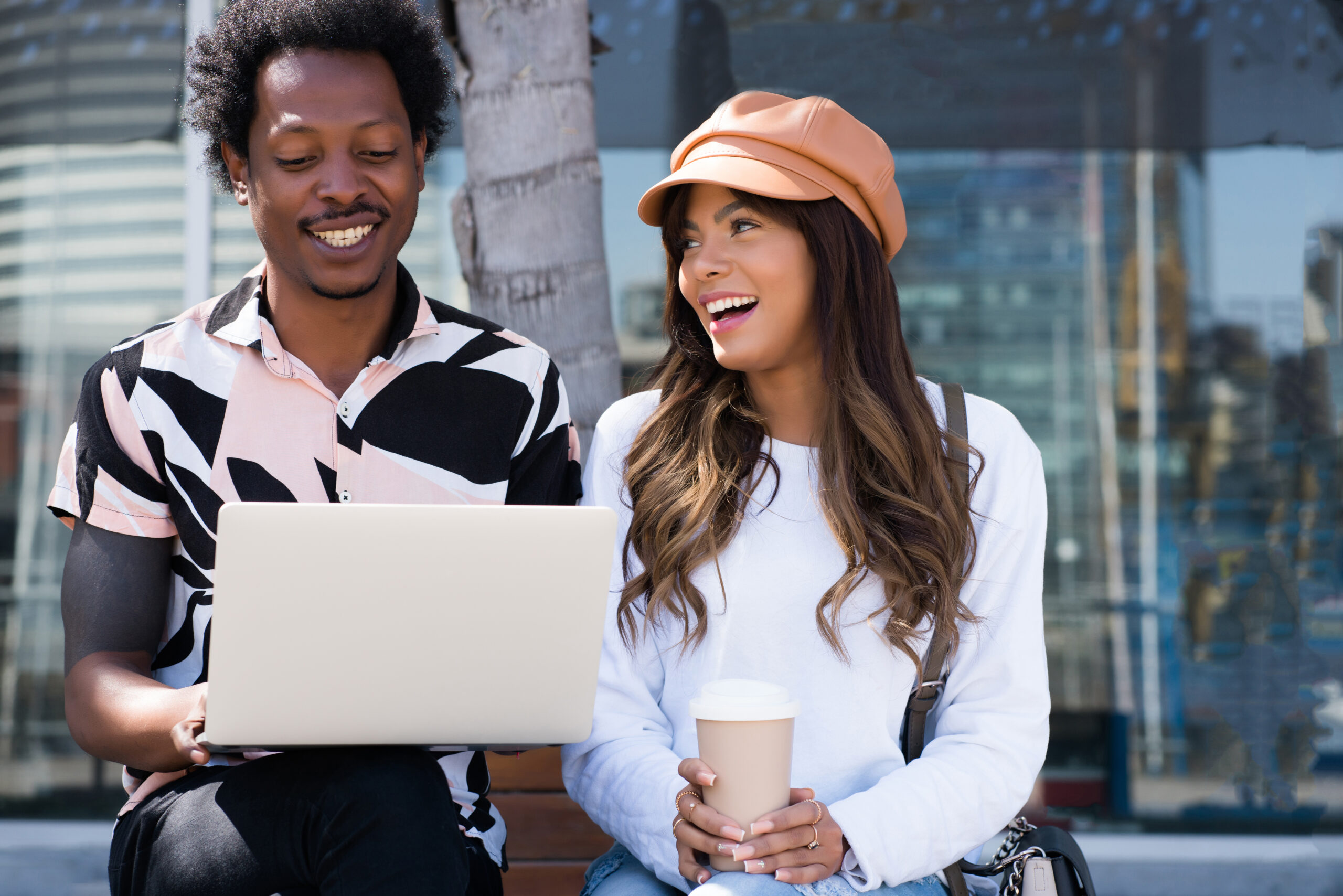 Why the Importance of Clear Brand Messaging Cannot Be Overlooked for Business Success - Couple of Laptop