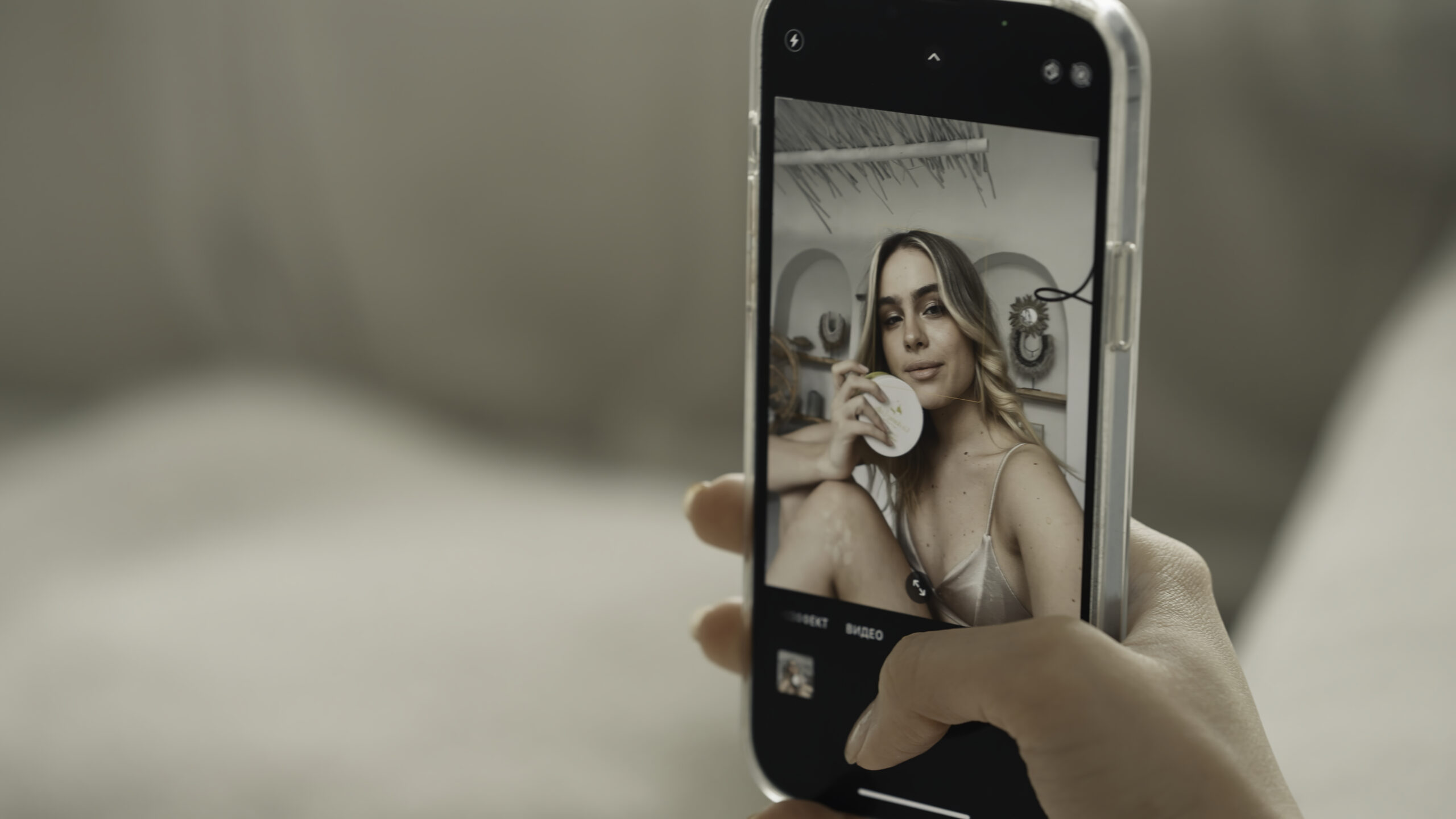 Instagram Reels vs Stories - woman filming in selfie mode