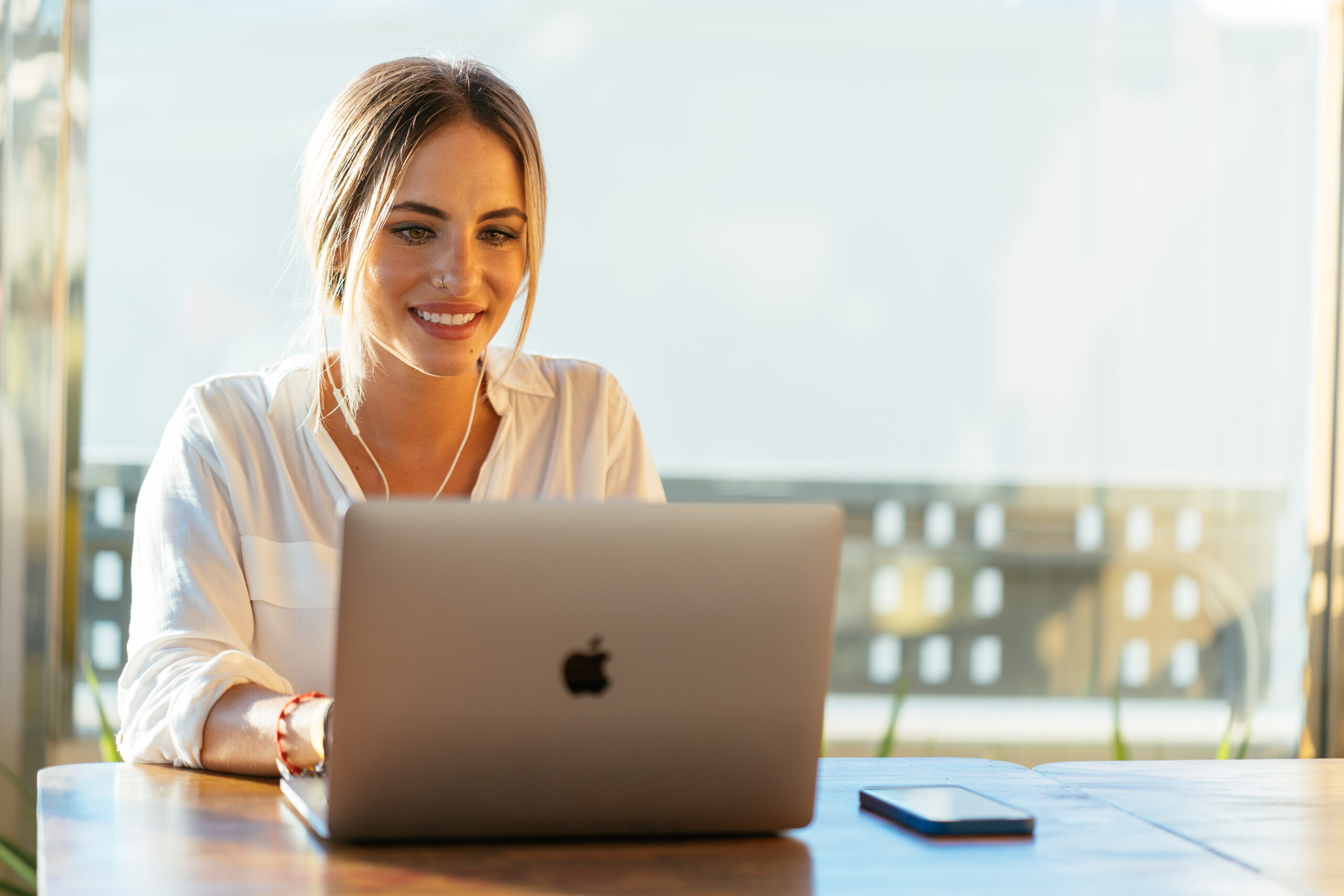 MacBook Hashtags - woman using MacBook