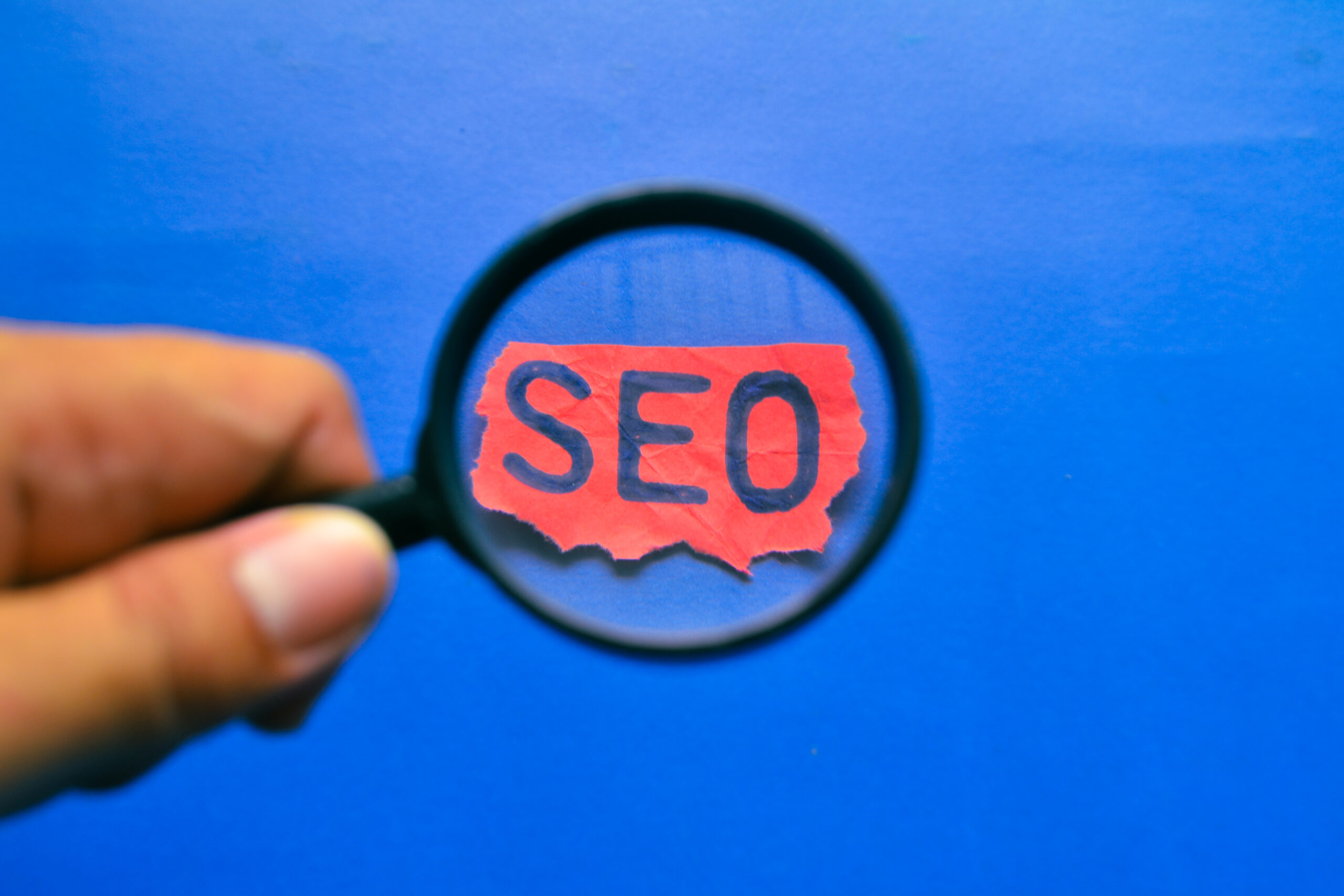 SEO Consulting UK - magnifying glass with SEO