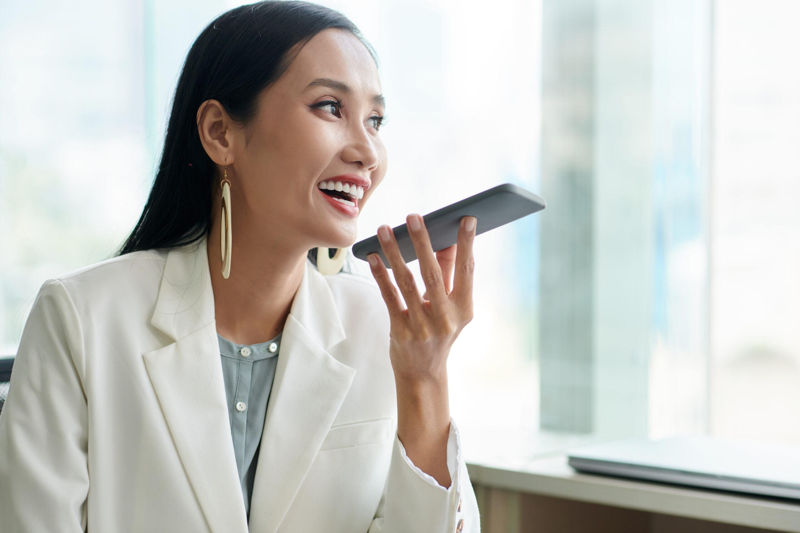 Searching by Voice - female using voice search